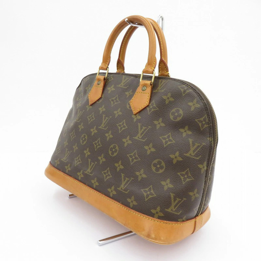 LOUIS VUITTON Monogram Alma Handbag Brown